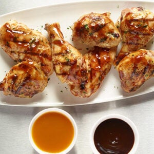 Grilled chicken with sauces on the side