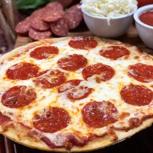 A pizza with pepperoni
